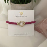 Pulsera de hilo ajustable fimos fucsia con dije corazón full circones