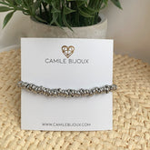 Pulsera de acero plateado con circulos doble