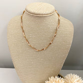 Collar snake ondeado dorado