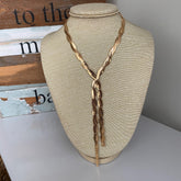 Collar snake dorado trenzado estilo corbata