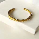 pulsera-ajustable-acero-dorado-perlas-circonias.jpg