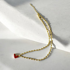 Collar de Acero Bañado en Oro con Corazón Rojo Esmaltado