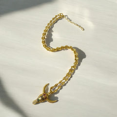 Collar de Acero Bañado en Oro con Dije de Toro y Circones