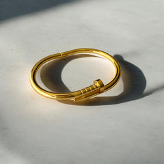 Pulsera Clavo dorado brillante