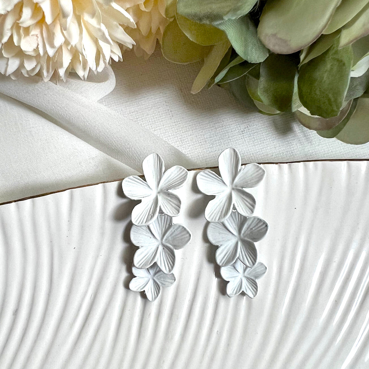 Aretes las flores blanco