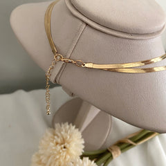 Collar snake dorado doble caida