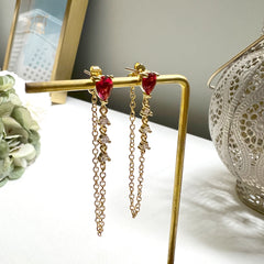 Aretes cadenita y circonia fucsia