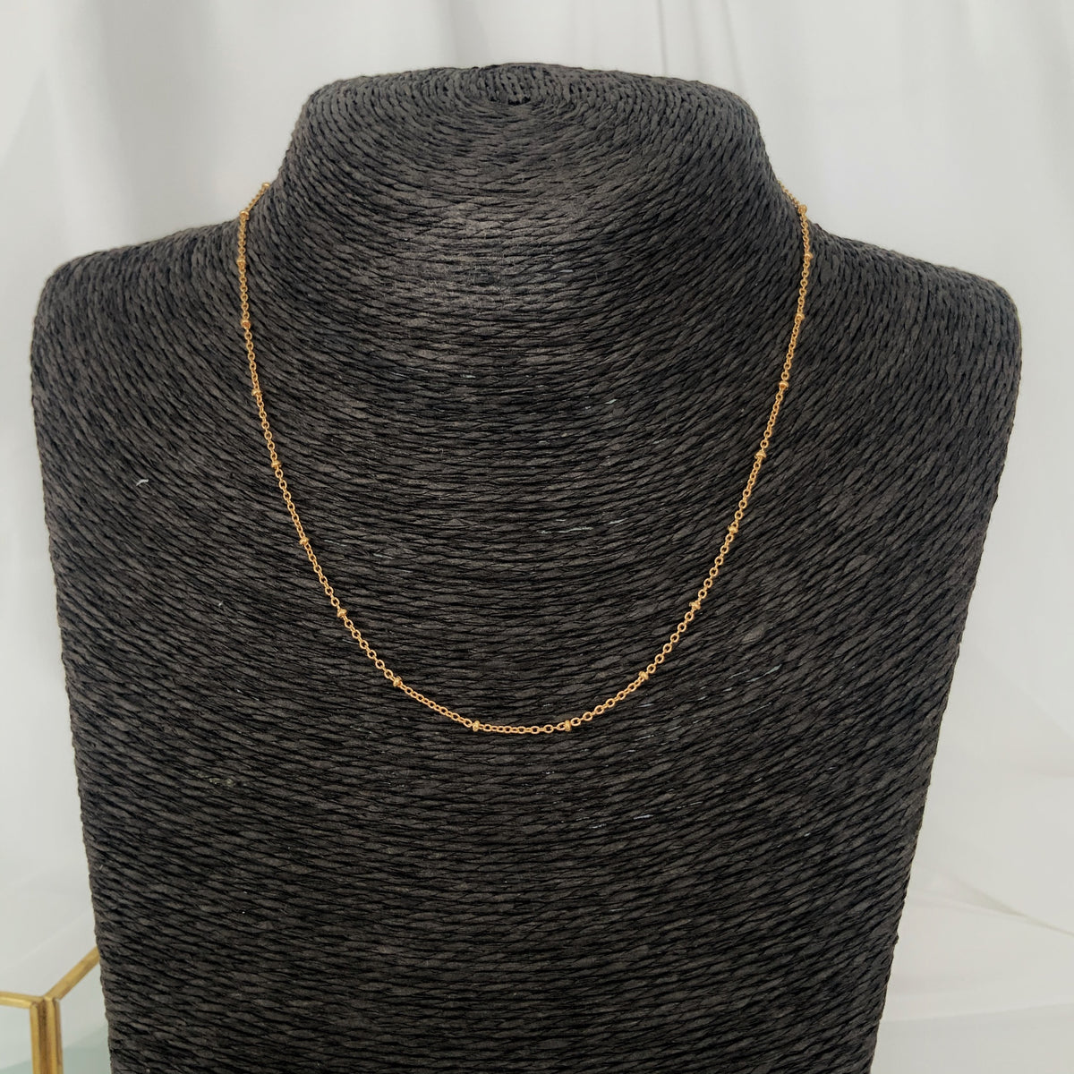 Cadena mini dots enchapado en oro 18k