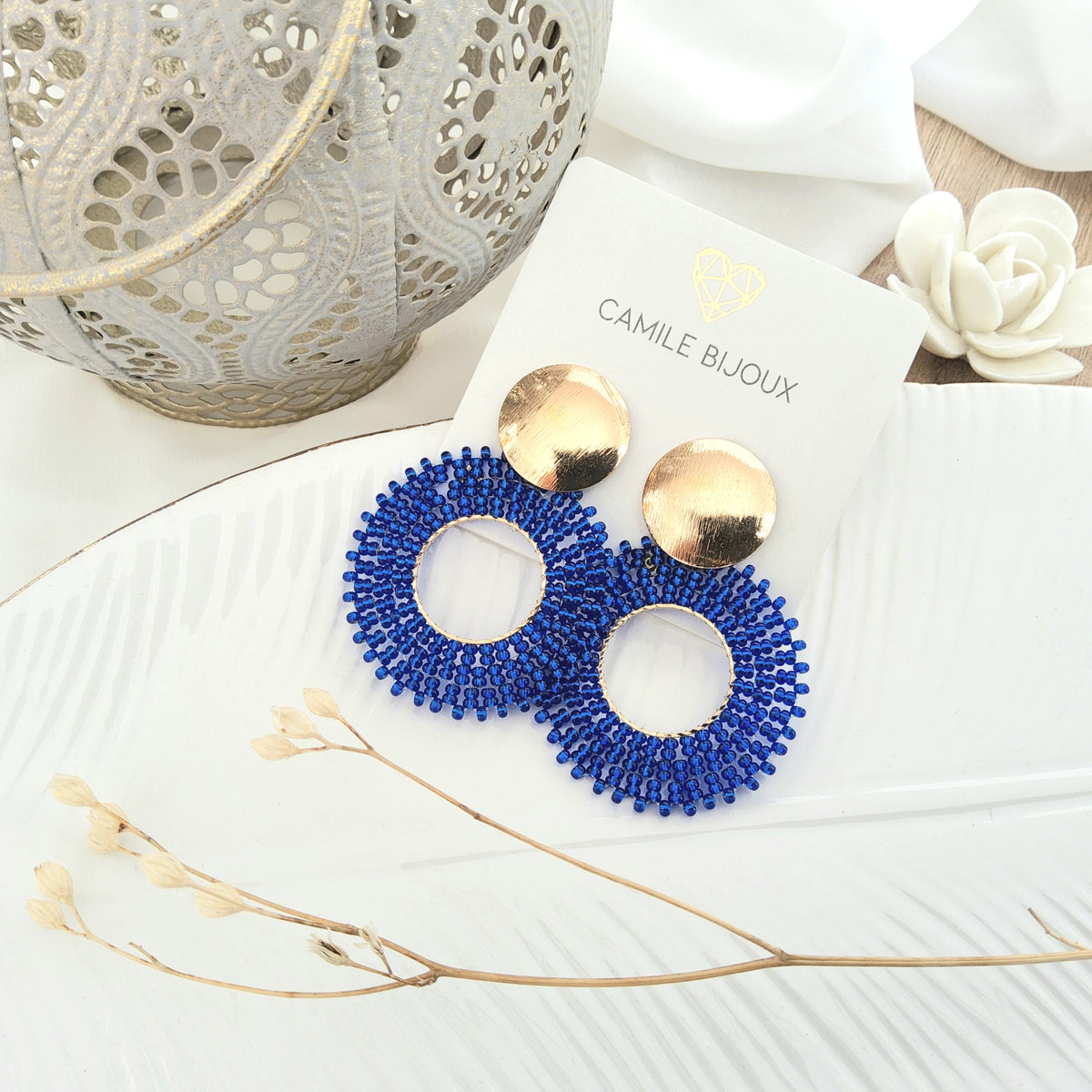 Arete semillita azul