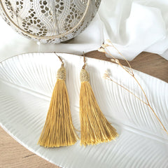 Aretes borla glam dorado