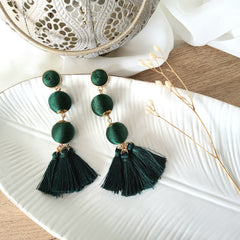 Aretes bolitas tejidas verde oscuro