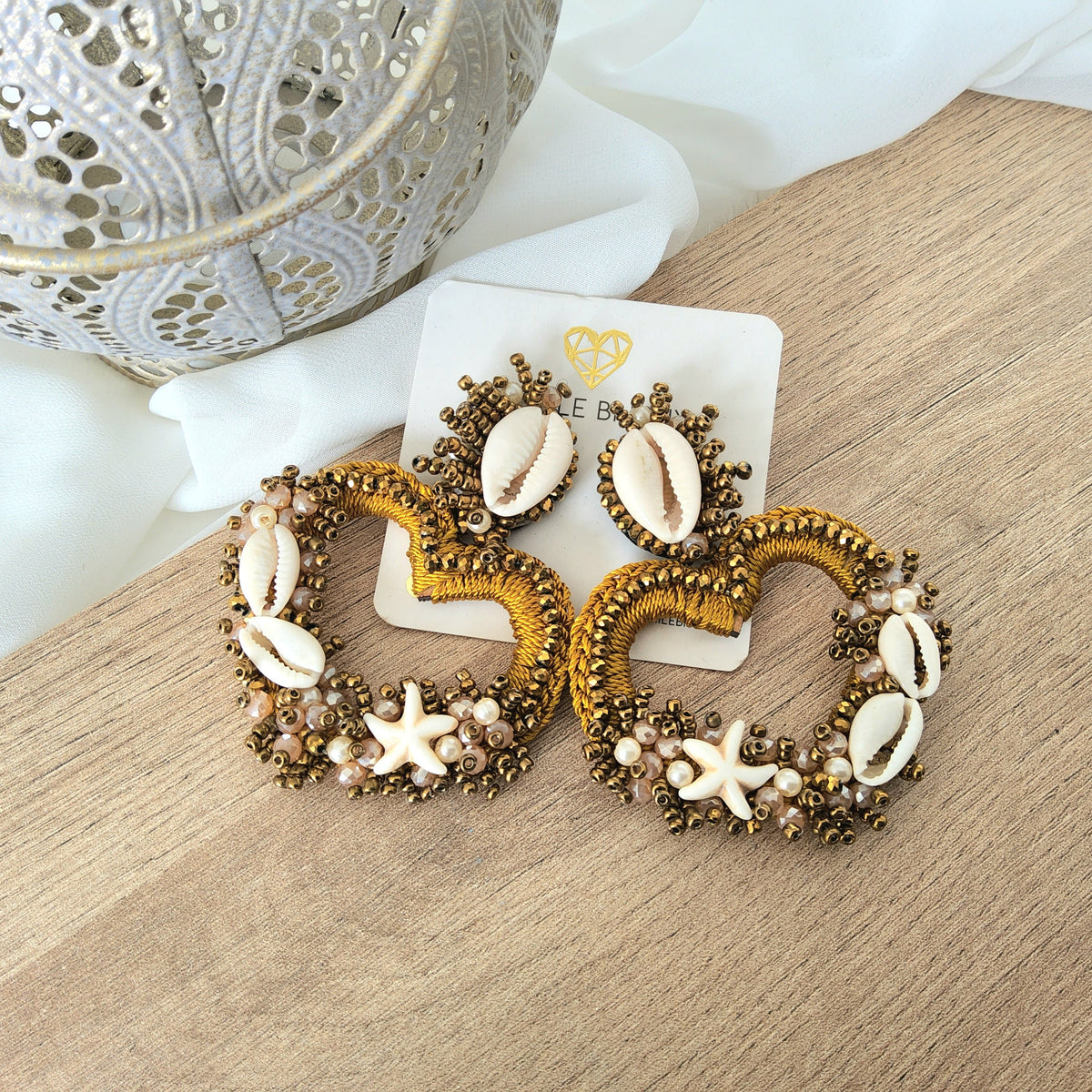 Aretes sea shell heart dorado