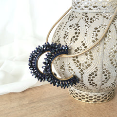 Argollas Bloom plata azul noche