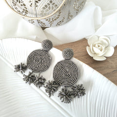 Aretes polka plata plateado