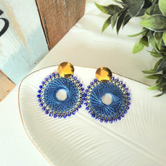 Aretes hilandera azul