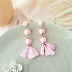Aretes bolitas tejidas rosado pastel
