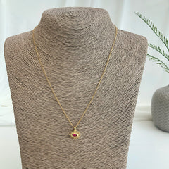 Collar con dije de sol y ojo rojo enchapado en oro 18k