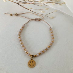 Pulsera de hilo ajustable smiley nude