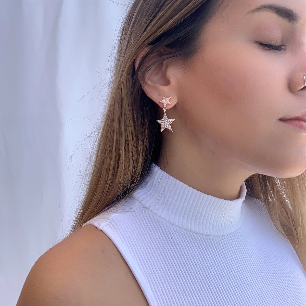 Aretes doble estrellas rose gold