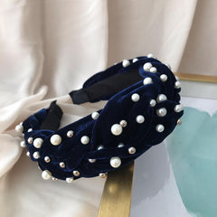 Diadema velvet azul oscuro con apliques