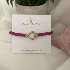 Pulsera de hilo ajustable fimos fucsia con dije corazón full circones