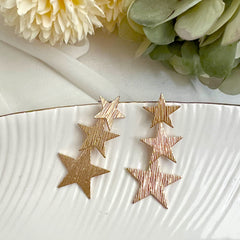 Aretes estrellas doradas