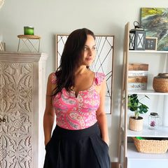 Body Alitas fucsia flores talla standard