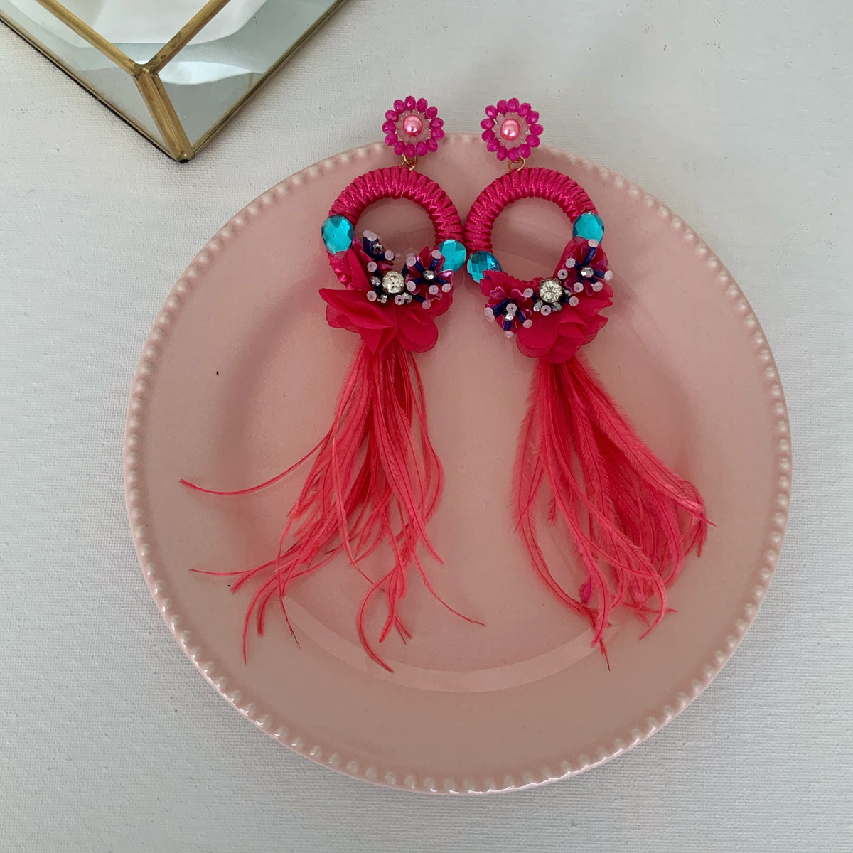 Aretes Feathers fucsia