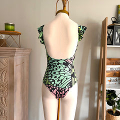 Body Alitas fucsia flores talla standard