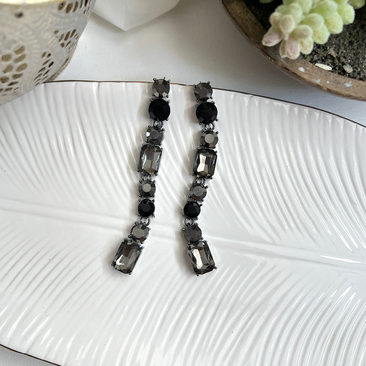 Aretes string cristales negro plomo