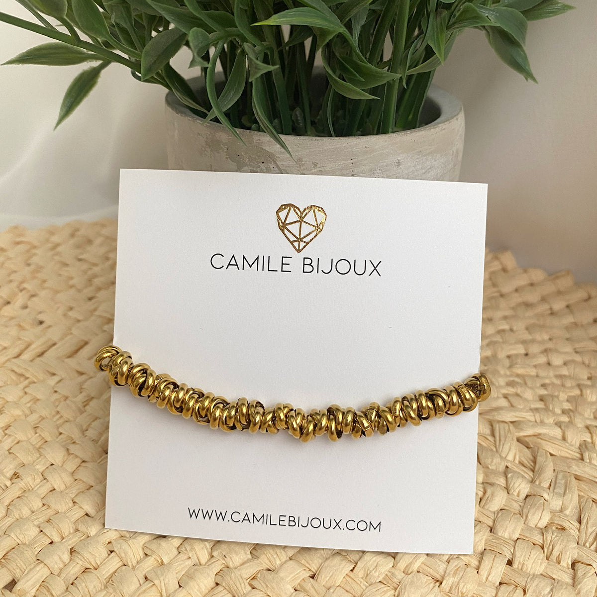 Pulsera de acero dorado con circulos doble