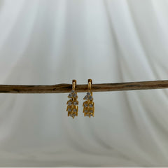 Mini argollas trébol en plata 925 bañadas en oro 18k