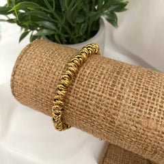 Pulsera de acero dorado con circulos doble