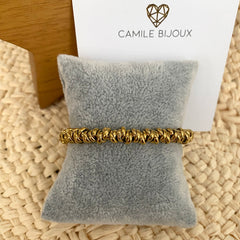 Pulsera de acero dorado con circulos doble