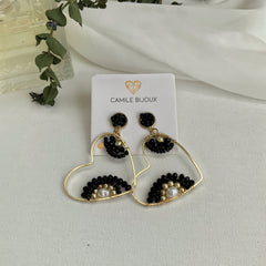 Aretes corazones de alambrismo negro