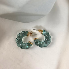Aretes argollas acrílicas twist celeste