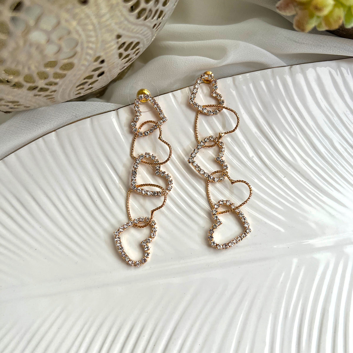 Aretes glam heart string clear