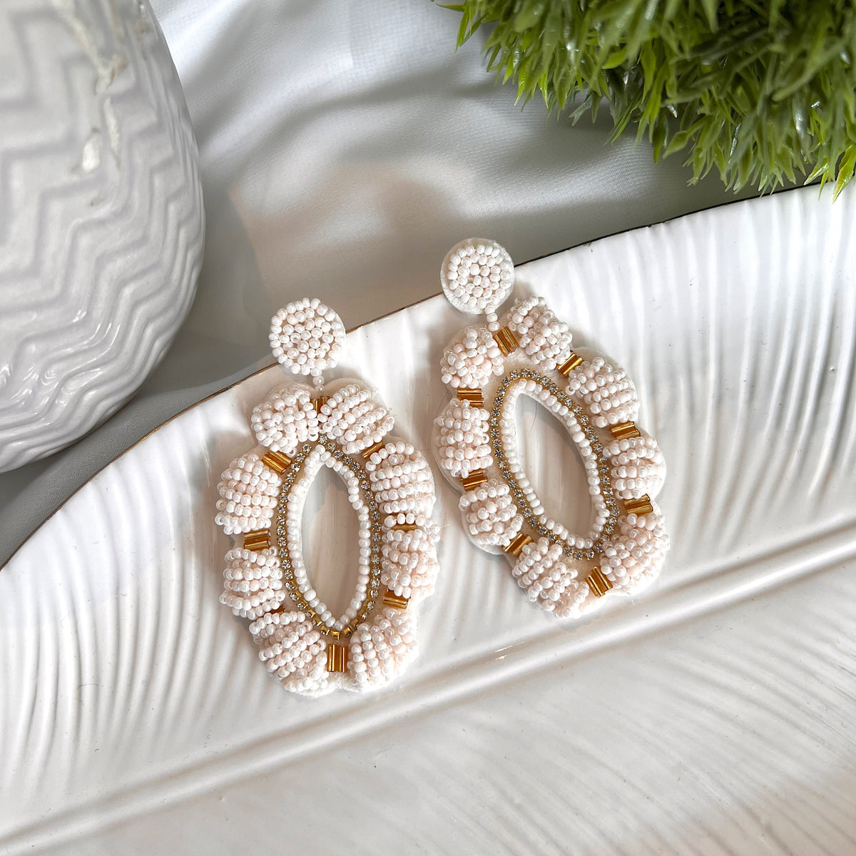 Aretes Moana mostacilla bordados hueso