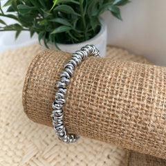 Pulsera de acero plateado con circulos doble