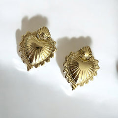 aretes en forma de corazon exvoto dorado en ecero