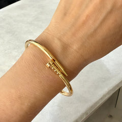 Pulsera Clavo dorado brillante